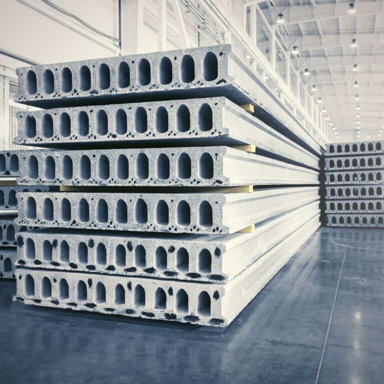 stack of precast reinforced concrete slabs in factory workshop